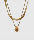 CORE SCULPTURAL PENDANT NECKLACE