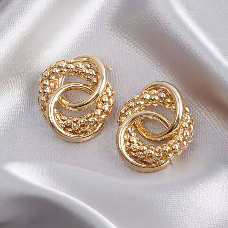 STATEMENT TWISTED KNOT EARRINGS