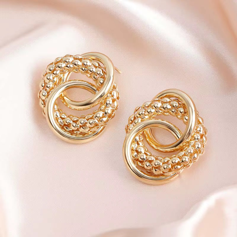 STATEMENT TWISTED KNOT EARRINGS