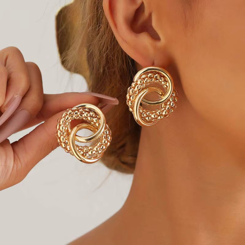STATEMENT TWISTED KNOT EARRINGS