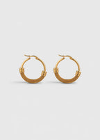 TORQUE SCULPTURAL HOOP EARRINGS