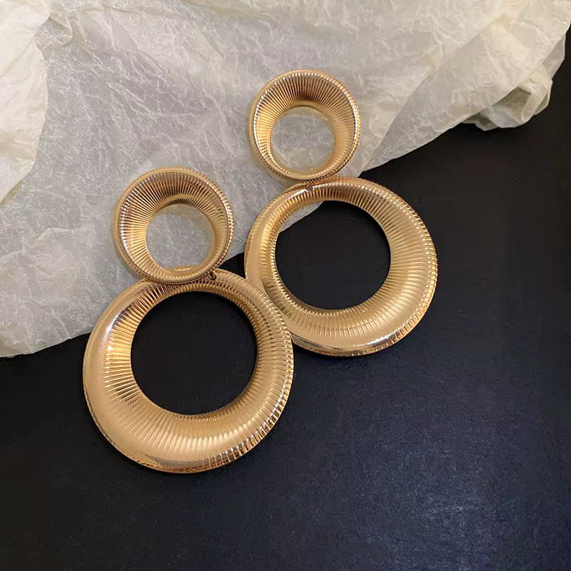 GOLDEN DOUBLE RING STATEMENT EARRINGS