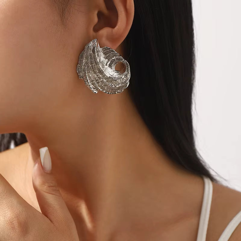 SEA SCULPTED SHELL STUD EARRINGS