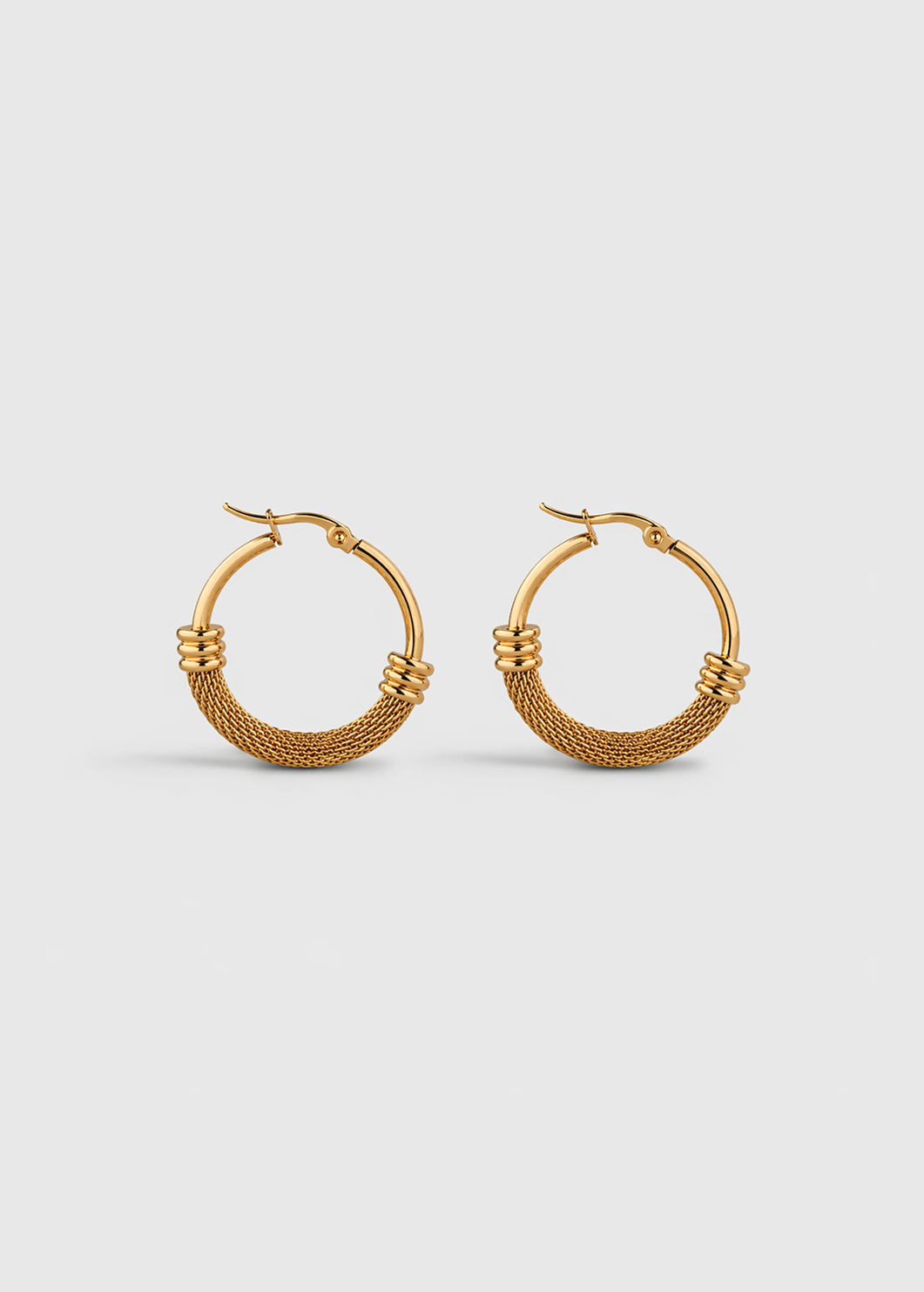 TORQUE SCULPTURAL HOOP EARRINGS
