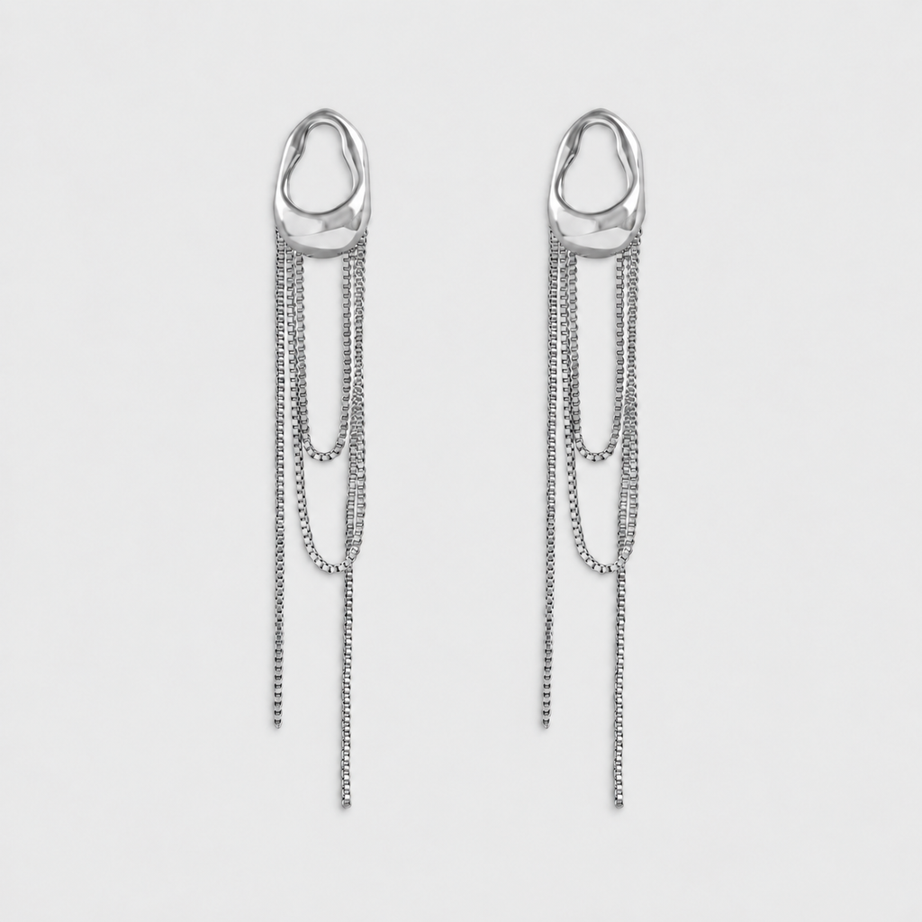 VILOA CHUTE Silver sculptural earrings, pair on light gray background