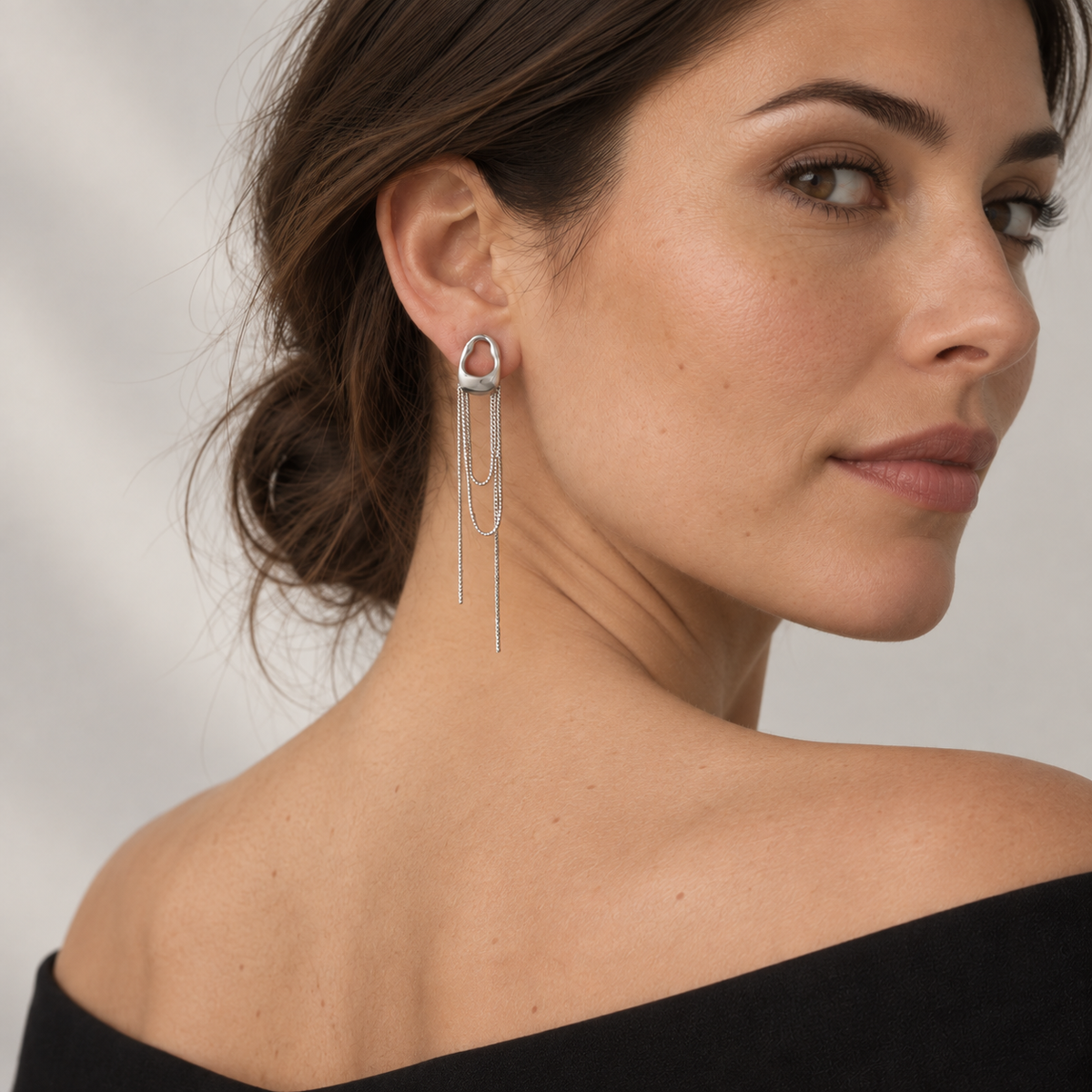 CHUTE Silver on model, over shoulder studio portrait — AI visualization